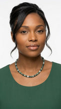 Load image into Gallery viewer, Woman wearing a green necklace agate stones against a white background