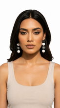 Load image into Gallery viewer, Pom Boho Chic Earrings (Stripe Variations) BLACK WHITE STRIPE DESIGN