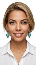 Load image into Gallery viewer, Woman wearing Sasha L Jewels Teal turquoise earrings with a white shirt on a white background