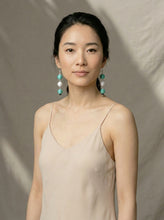 Load image into Gallery viewer, Woman wearing a beige dress and Sasha L Jewels Boho Chic Collection Earrings