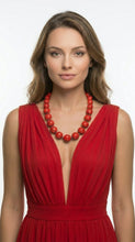 Load image into Gallery viewer, Woman wearing a red dress with a deep neckline and a matching red stone necklace. Sasha L Jewels stone necklaces.