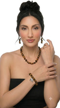 Load image into Gallery viewer, Tiger's Eye Elephant Charm Bangle