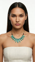 Load image into Gallery viewer, Woman wearing Sasha L Jewels urquoise fan necklace. Fashion Week Summer Style