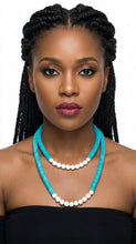 Load image into Gallery viewer, Woman wearing a black top with Sasha L Jewels turquoise  stone necklaces and white beads